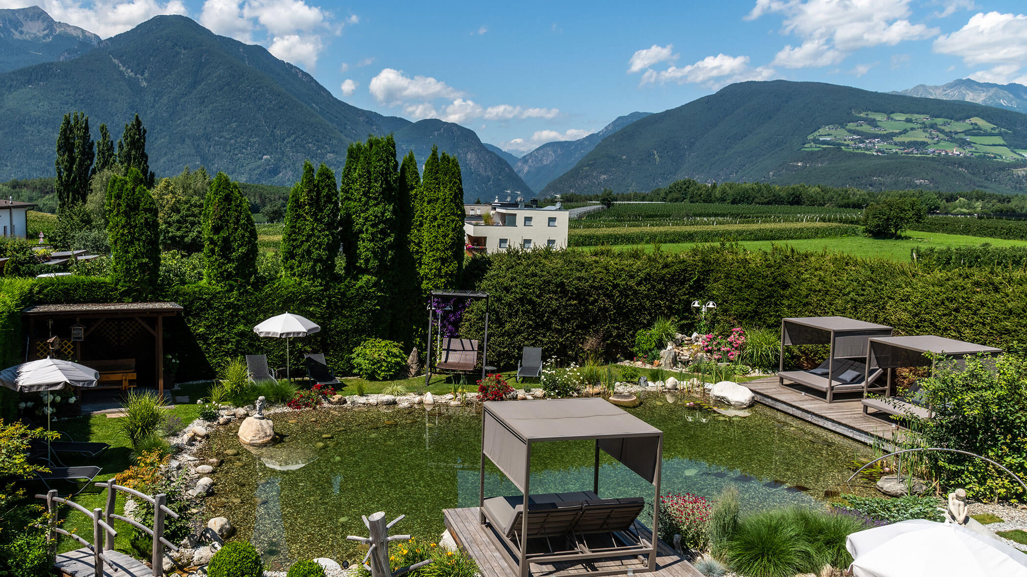 Hotel mit Garten & Naturbadeteich im Freien - Hotel Sun