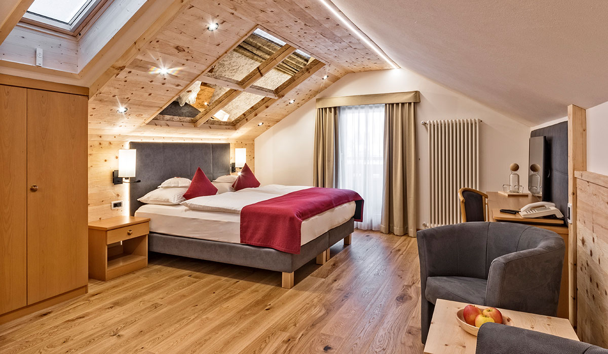 Doppelzimmer Deluxe Pinova - Innenansicht - Schlafen - Hotel Sun