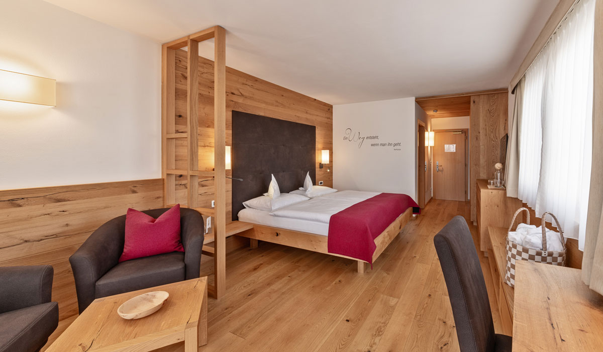 Zimmer - Golden Delicious - Bett - Hotel Sun